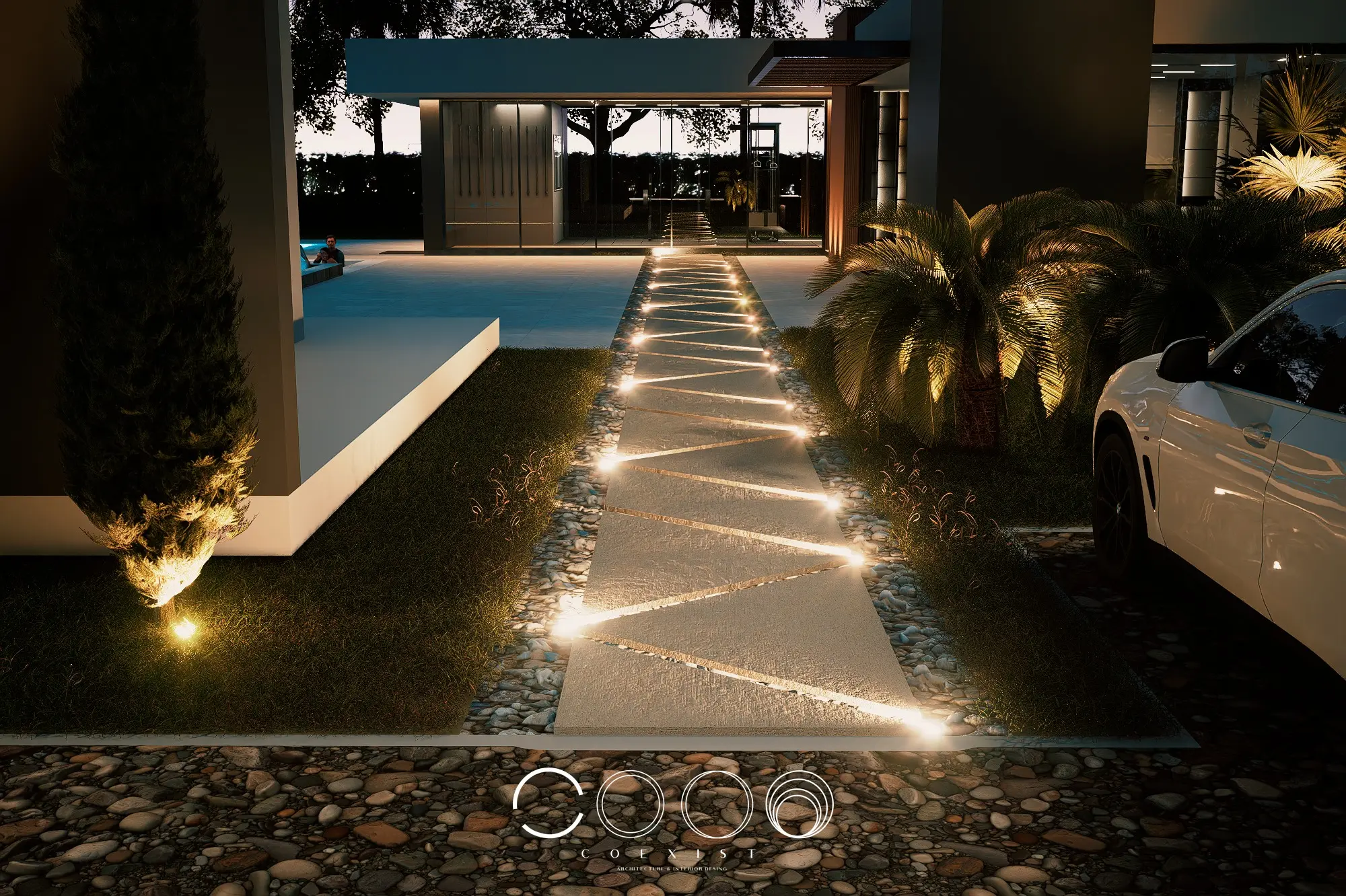 Sendero exterior iluminado de conexión con la zona de entretenimiento de Casa La Elisa