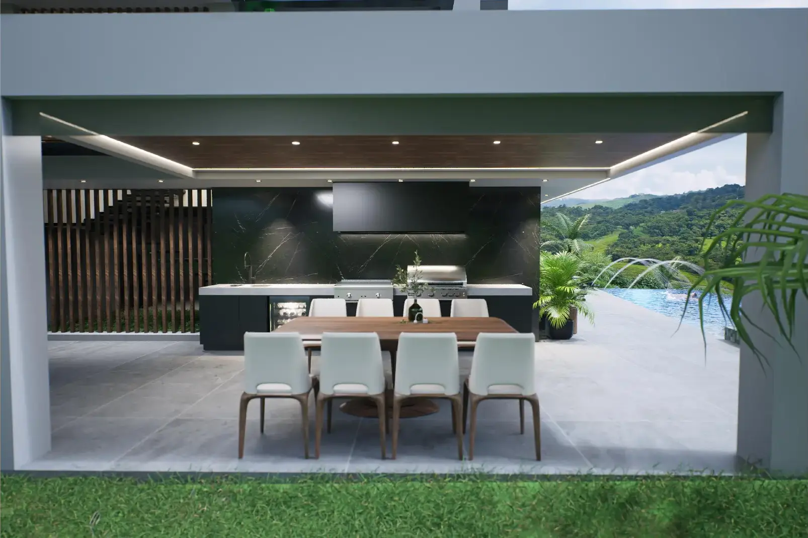 Terraza social de Casa San Martín con zona de cocina y comedor exterior