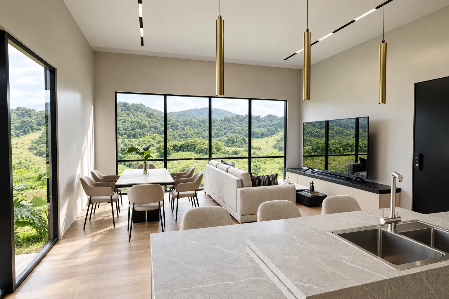 Interiorismo de la zona social y cocina integrada de Casa Tesalia con paisaje visible por los ventanales